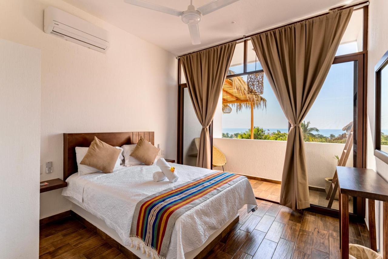 Punta Kai Hotel & Hostal ปูแอร์โตเอสกอนดิโด ภายนอก รูปภาพ