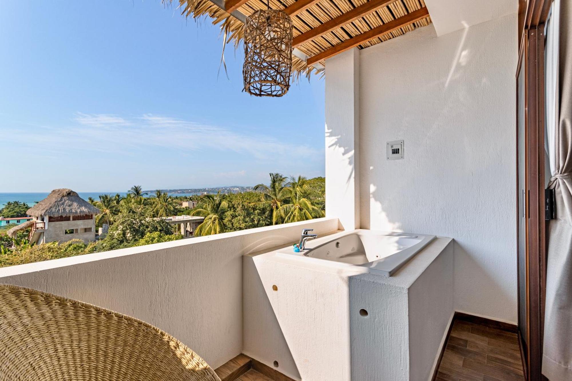 Punta Kai Hotel & Hostal ปูแอร์โตเอสกอนดิโด ห้อง รูปภาพ